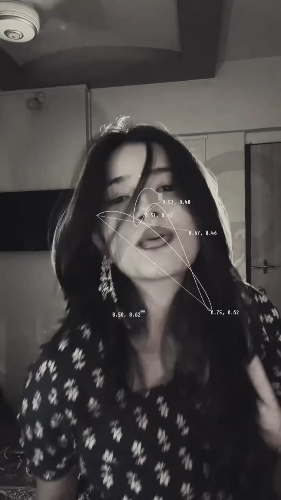 Black and white slow motion frame with face tracking lines from the CapCut fashion video template