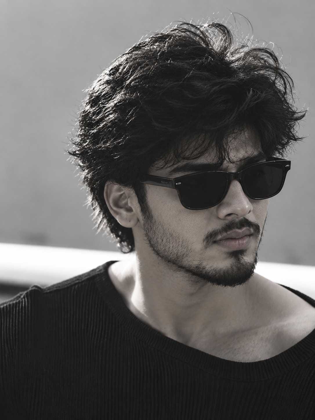 Boy version of SRK style image prompt black and white sunglasses portrait